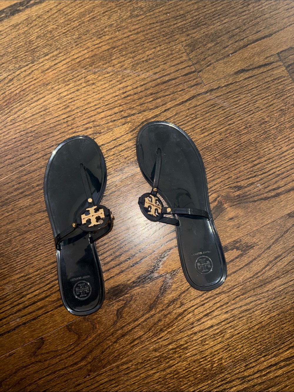 Tory Burch Black Jelly Logo Thong Sandals with Gold-Tone Emblem
